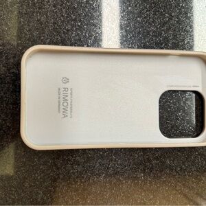 Used rimowa iPhone 15 pro silver phone case